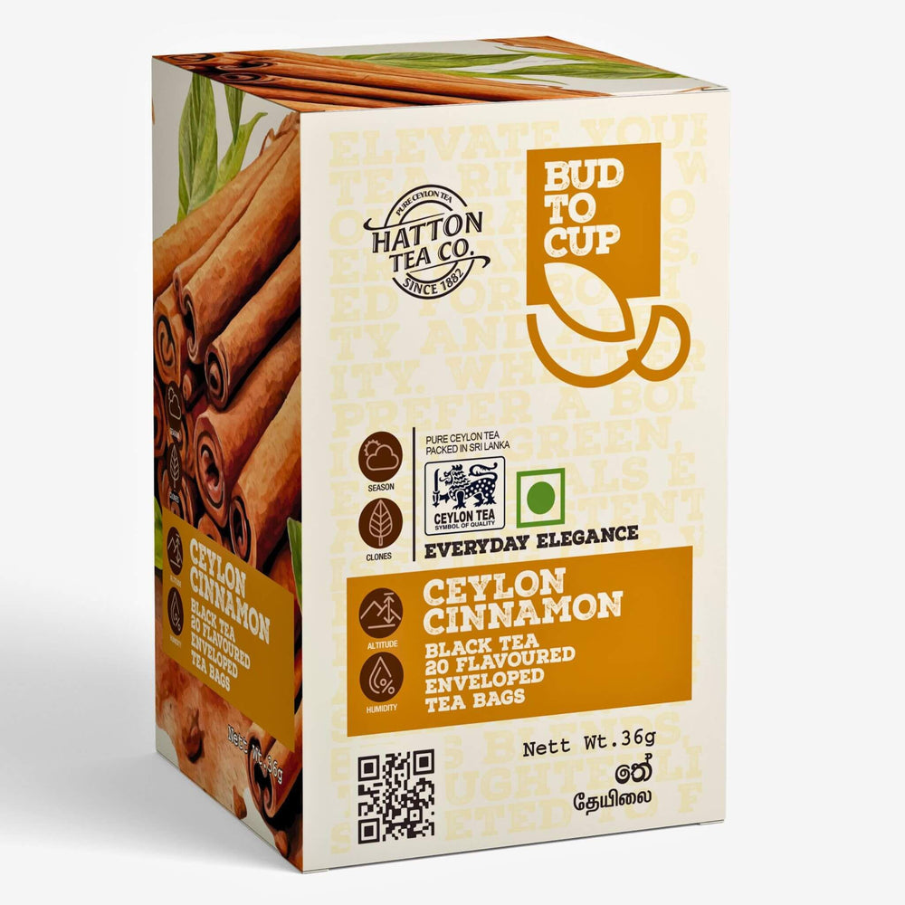 Box of Ceylon Cinnamon black tea from Hatton Tea Co. with cinnamon sticks on a white background.