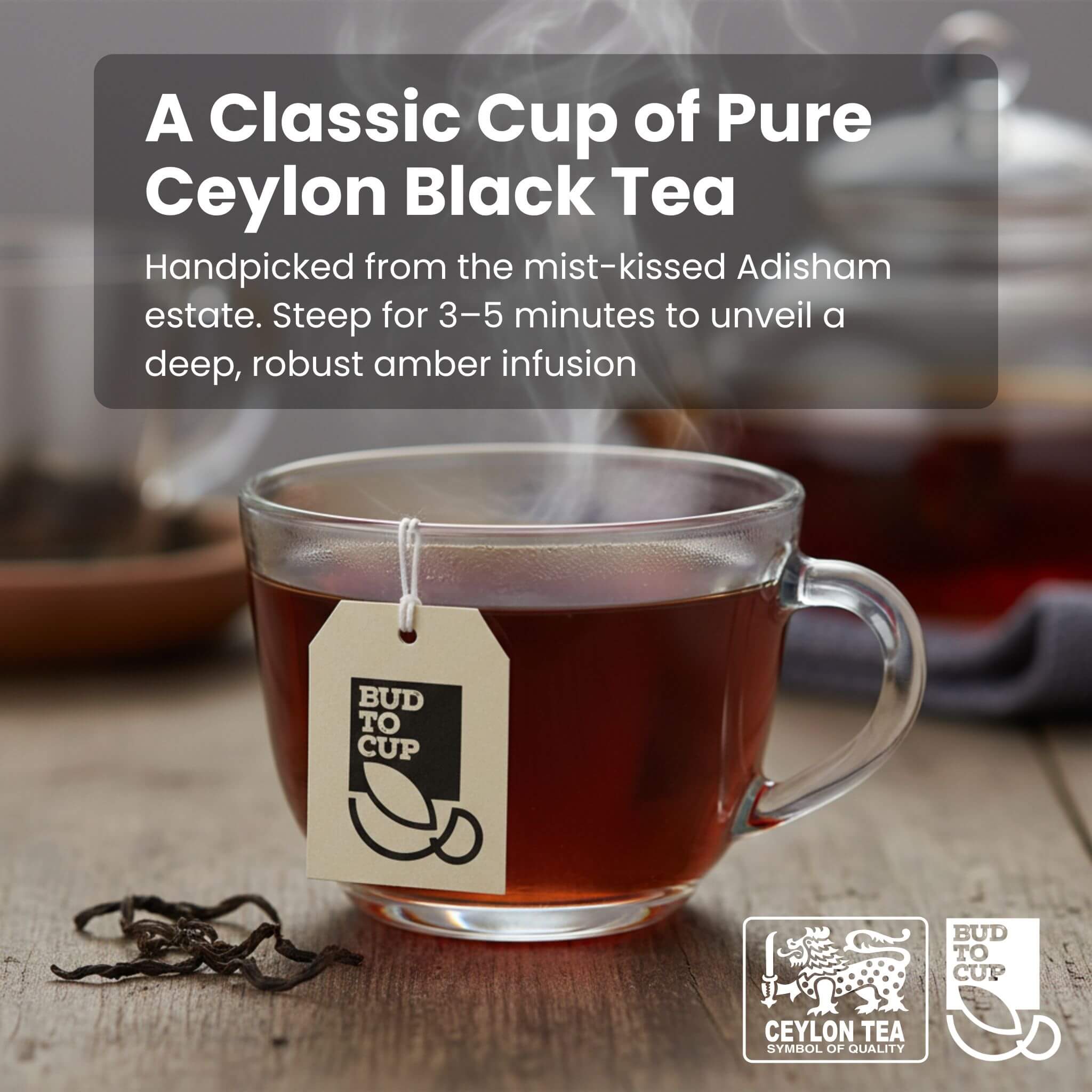 Glass cup of black tea with a 'Bud to Cup' tag on a wooden surface, featuring text about Ceylon black tea.