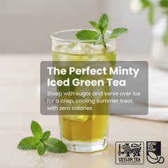 Glass of iced green tea with mint leaves on a light background, featuring text about the perfect minty iced green tea.